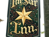 Hand painted and gilded double sided projecting sign